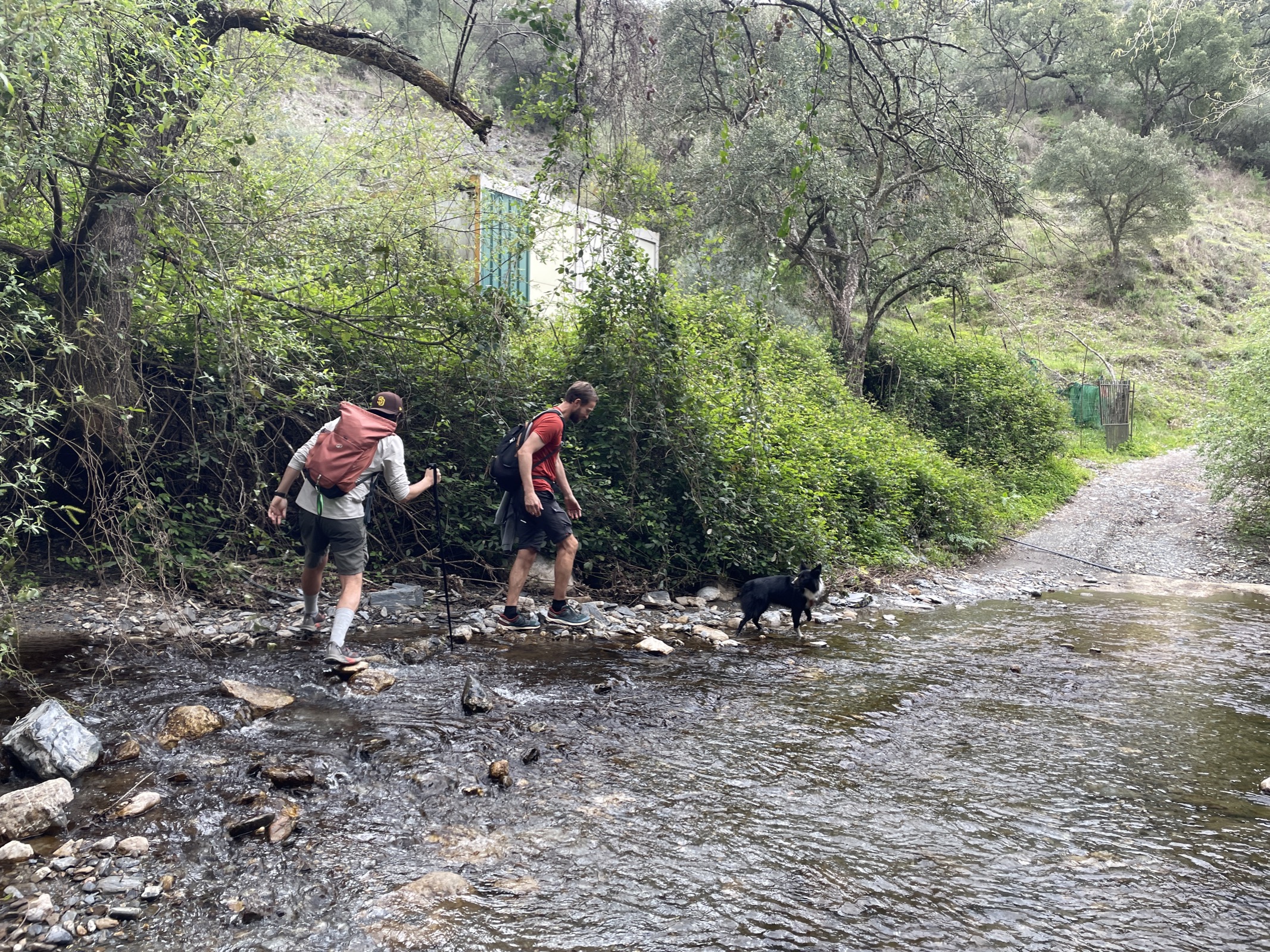 Friends together at the river near Cortes