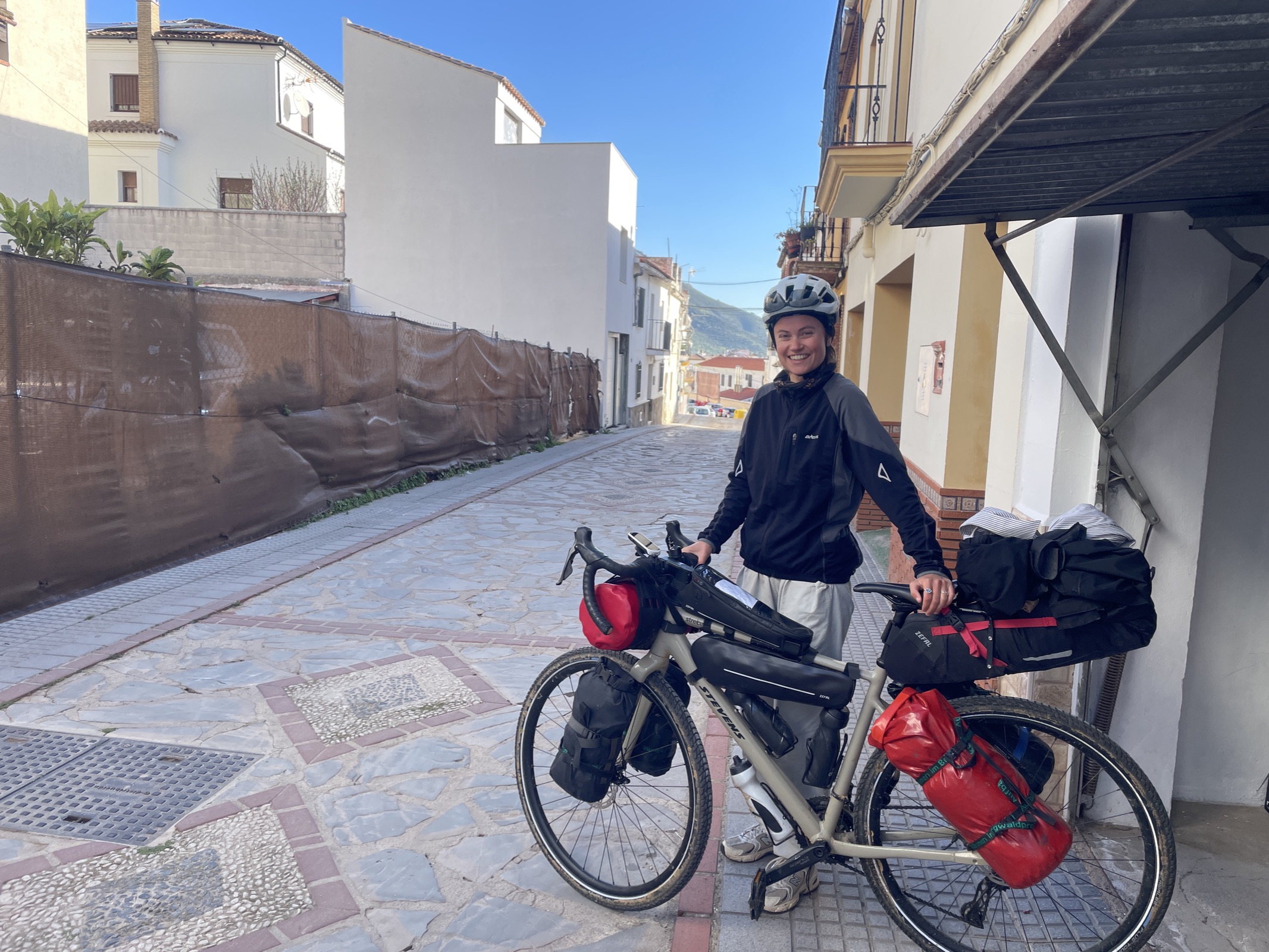 Another WarmShowers visitor with loaded panniers outside the house